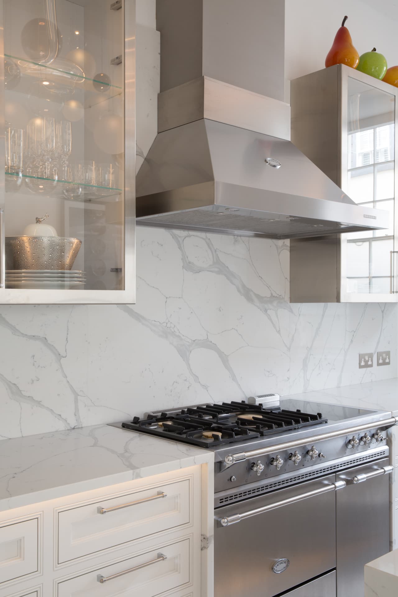 Heritage kitchen with range cooker and glass-fronted cabinets